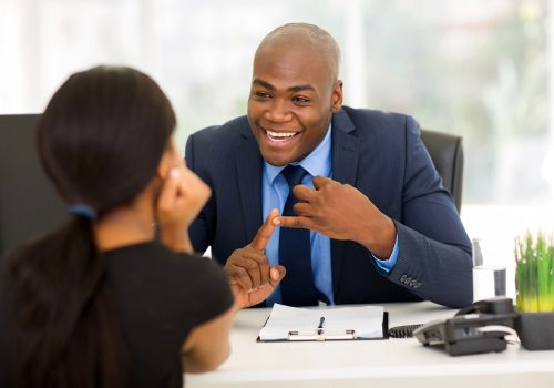 friendly african american businessman meeting with client